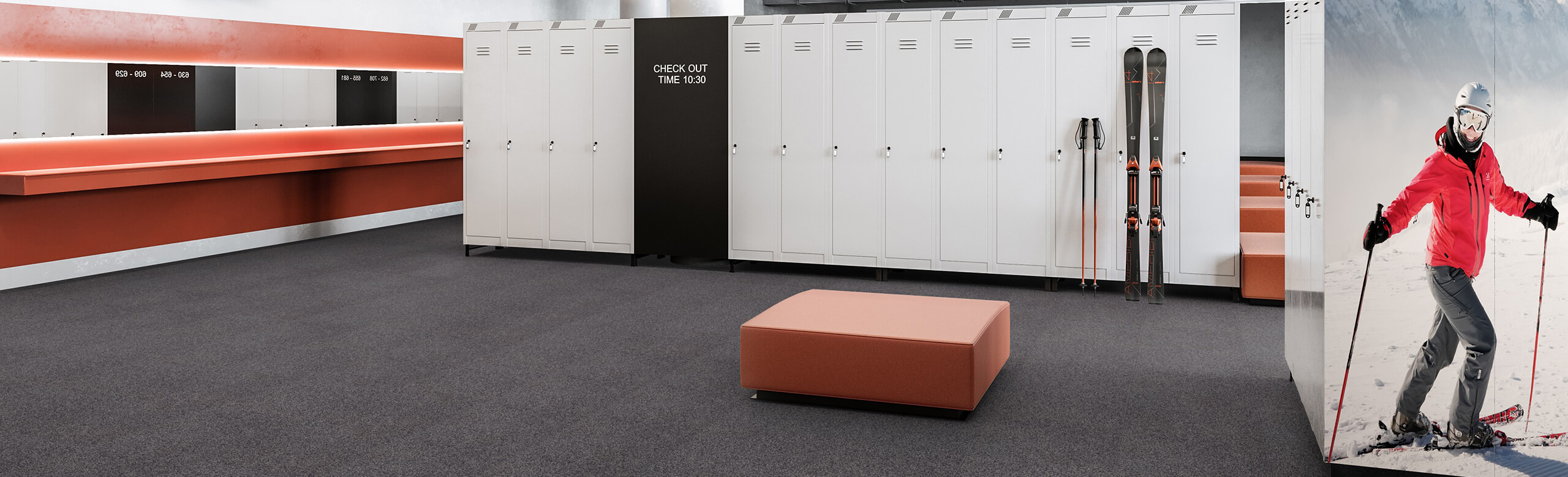 A dark REGUPOL everroll alpine flooring in a ski depot with many lockers for storing skis and ski equipment