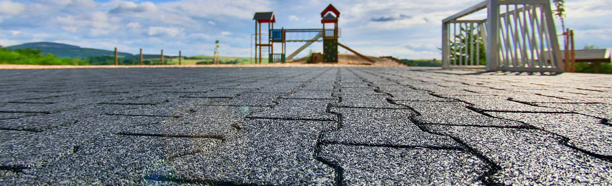 Small playing field with REGUPOL playfix VB interlocking pavers - the versatile floor covering Small playing field with goal, laid with robust, non-slip REGUPOL playfix VB interlocking pavers in black